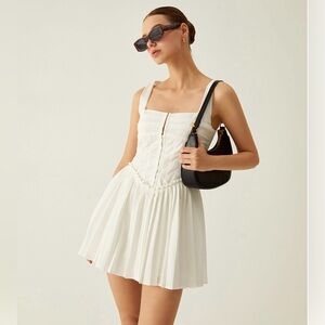 White Mini Dress with Corset Top and Pleated Skirt